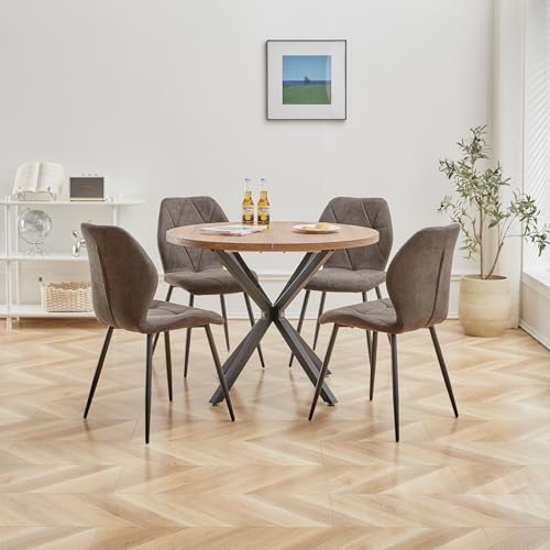 runt bord med stolar